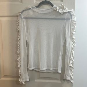 See through shirt with ruffles on sleeve